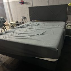 Beautiful gray queen bed frame with mattress
