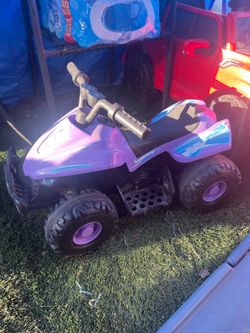 Kids ride on quad