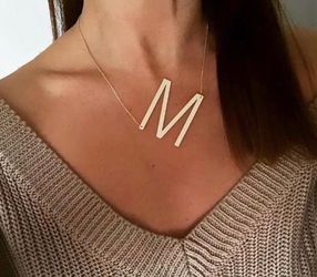 Necklace with the letter m