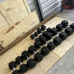 New pair of 20,25,30,45,50,55 and 60lb rubber dumbbells NEW IN BOX $570