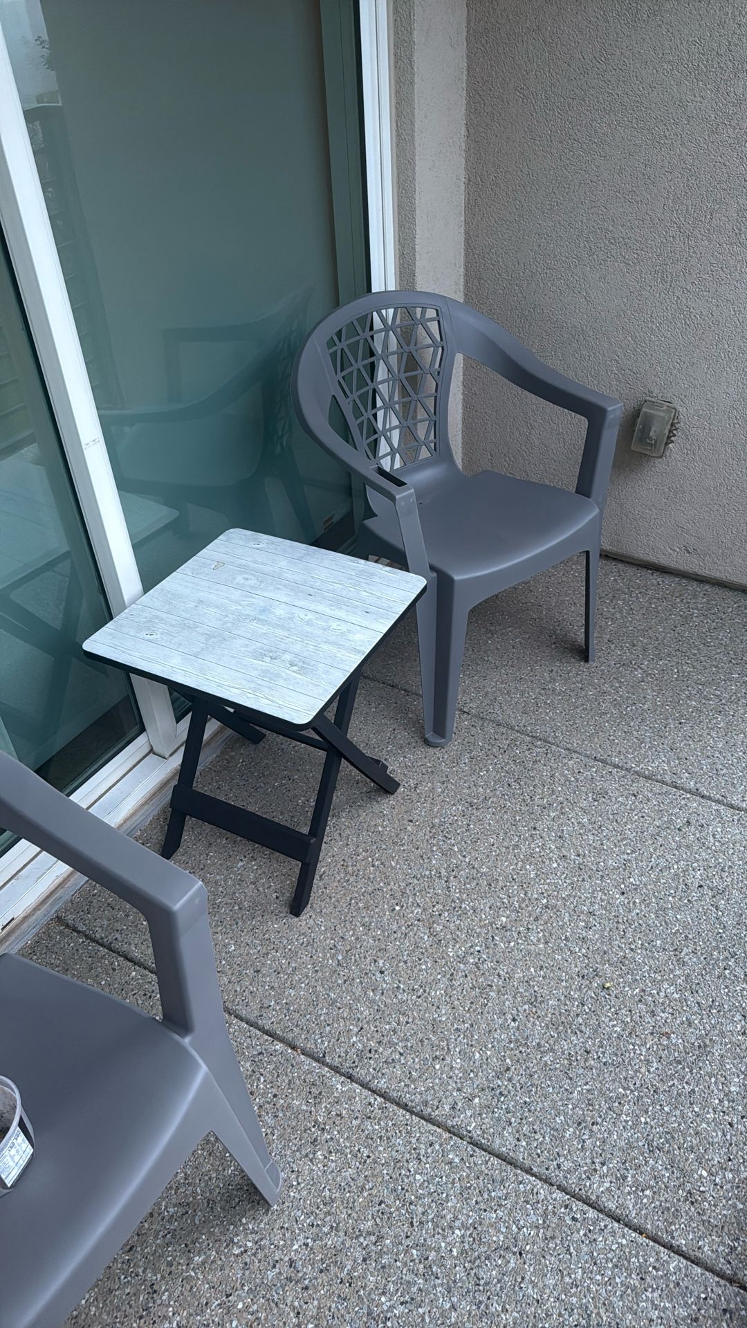 Two Chairs And Outside Table