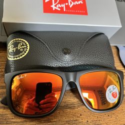 Ray Ban Justin’s 54mm.  Black Frame with Polarized Red Flash Mirror Lenses. Brand New & Authentic. 