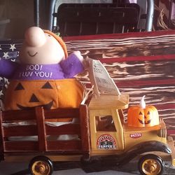 Wood crafted truck with pumpkin