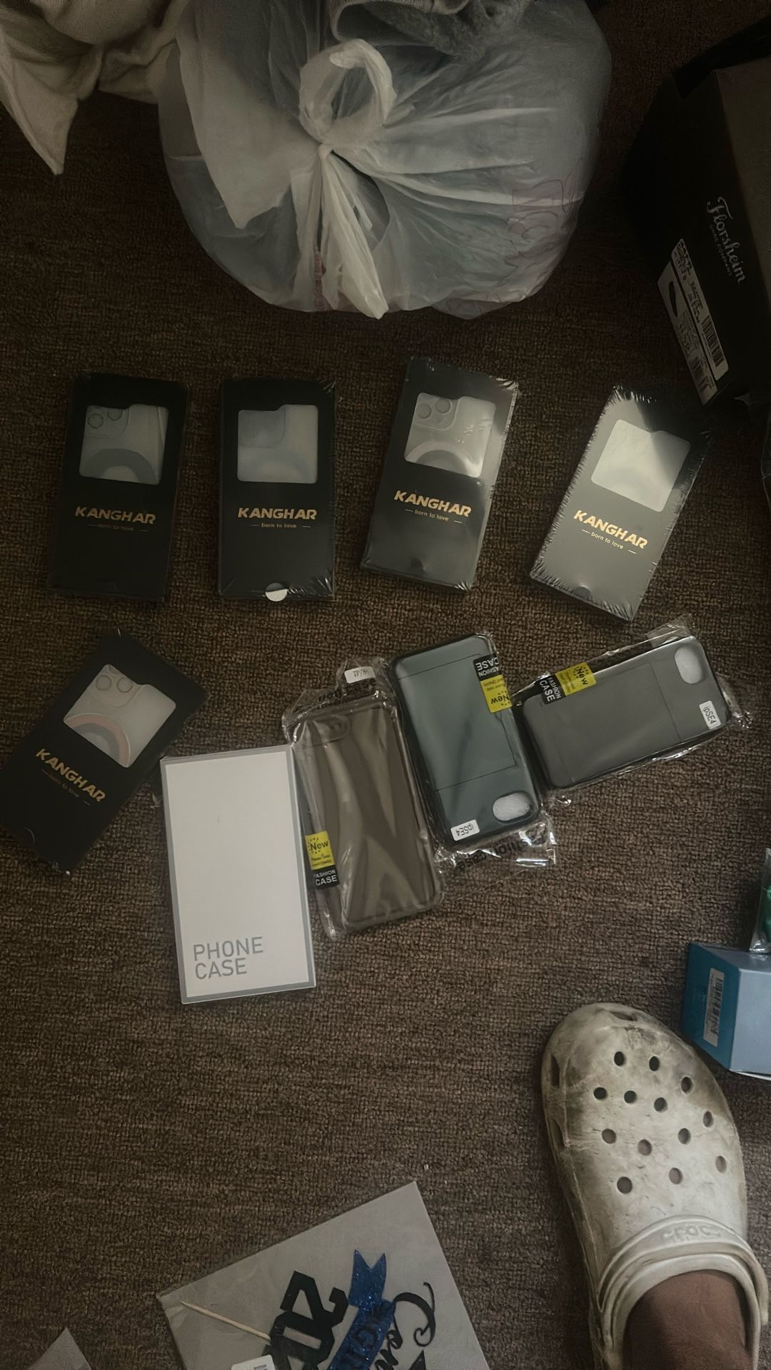 Assorted iPhone, and android cases