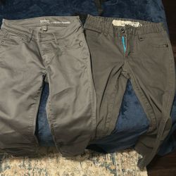 Three pairs of pants, two size 0 one size 2
