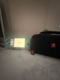 Nintendo switch lite with extras like pro controller, extra GB, etc.