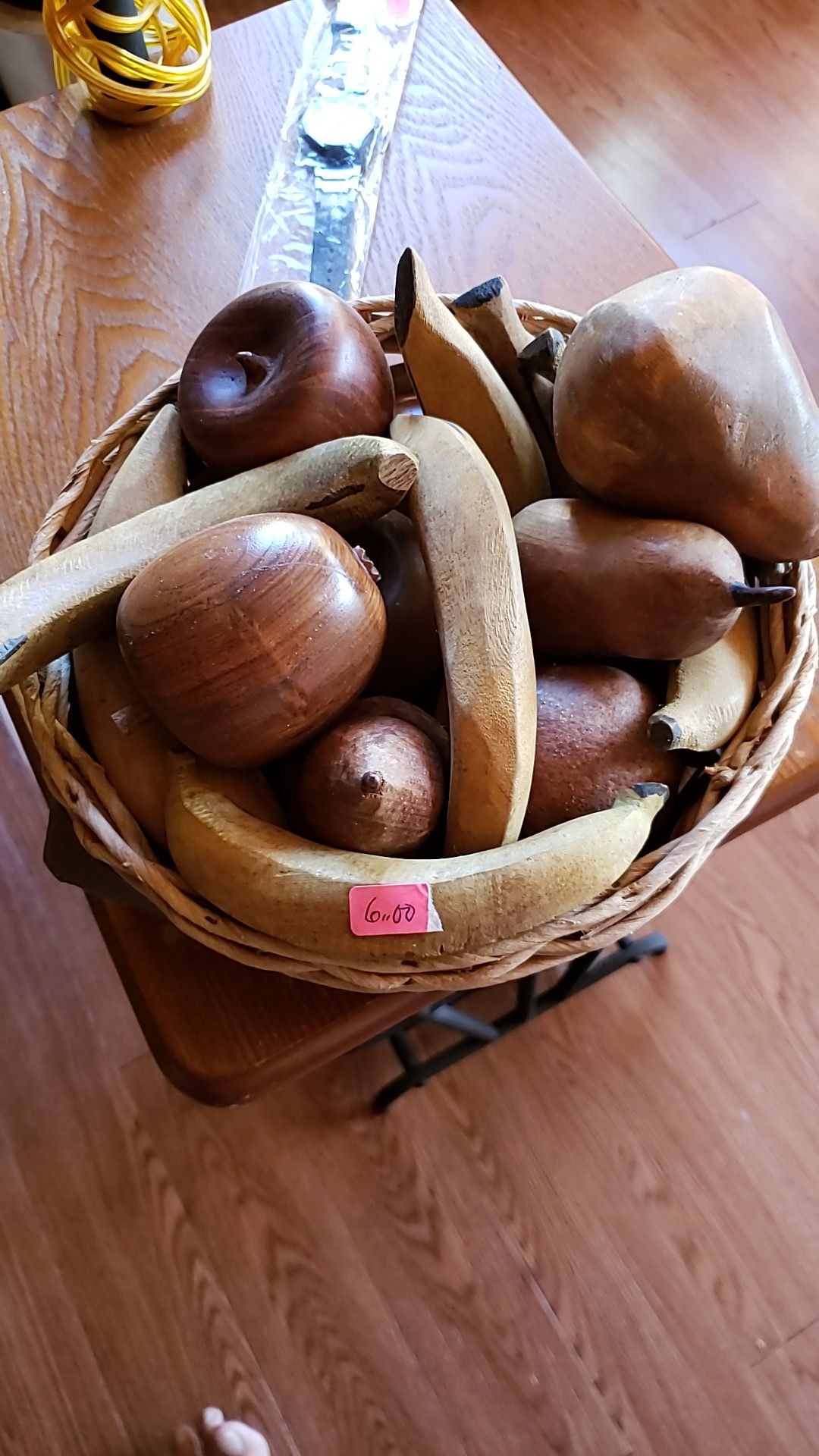 Large basket full of wooden fruit