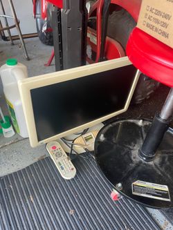 White tv with remote