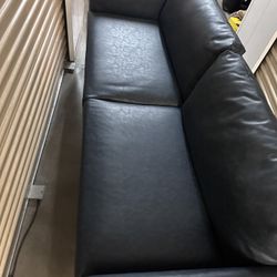 Blue vinyl sofa