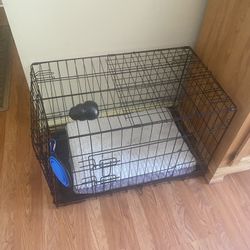 Portable Dog Cage.$10.  Exercise Bicycle $15.    Like New  Name Brand Ceramic Fry pans $10.  Like new Bed  Slides Out To Make A Queen Size Bed Mattres