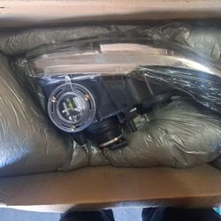 ** New** 2016 Chev Impala Headlamp Assembly 