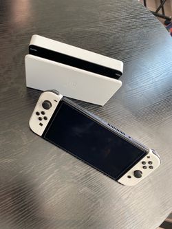 Nintendo Switch OLED with Dock and Pro Controller