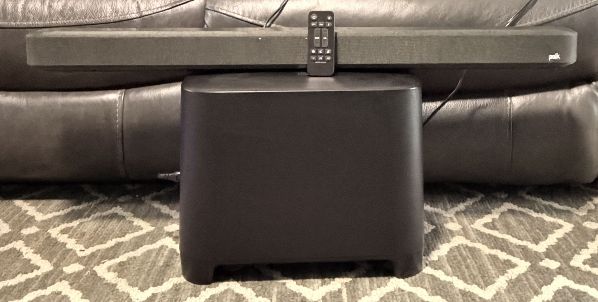 Polk DBRX1 is a 38" cinema soundbar system that includes a wireless subwoofer (DSW2) and offers Dolby Digital 5.1 