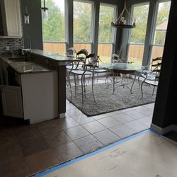 Glass Table With Leather Bottom Four Chairs with Leather Bottom 