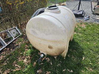 A 225 Gallon Water Tank.