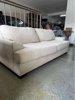 Cream modern loveseat sofa