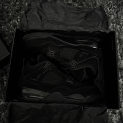 Black Cat Jordan 4s