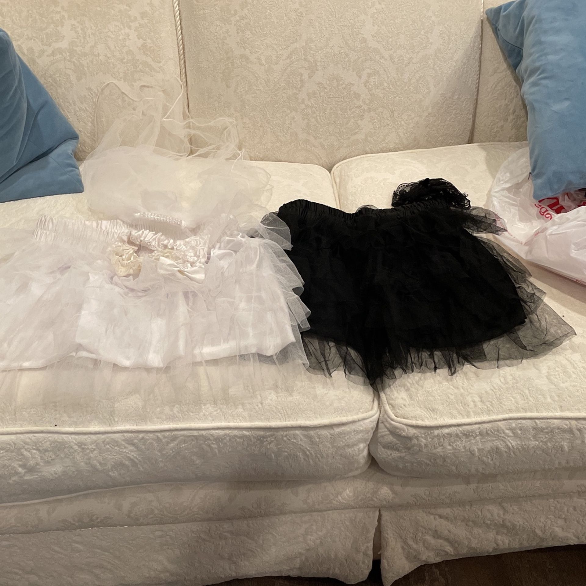 Halloween costume black and white tutus with a girl and a white way they’ll