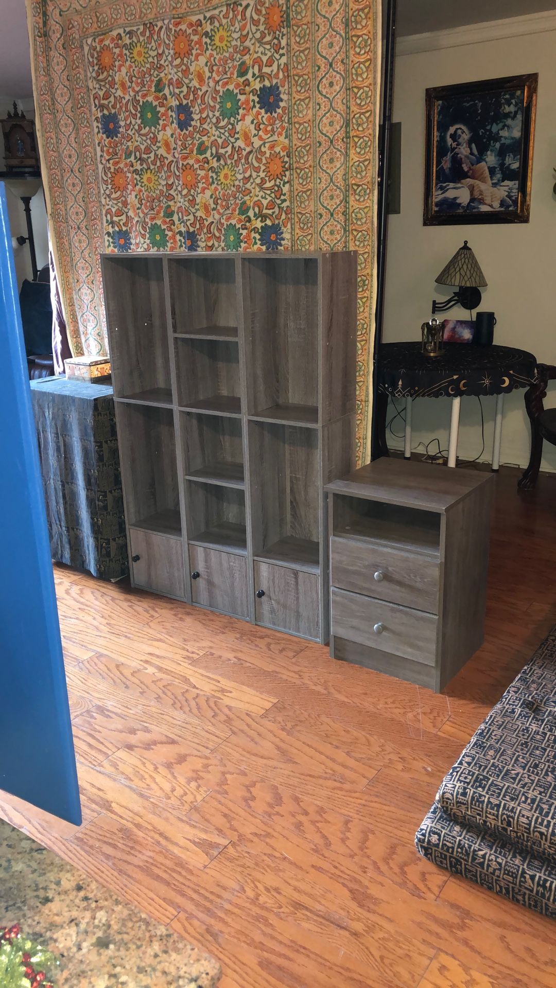 3 Grey Bookcases And 1 Grey End Table