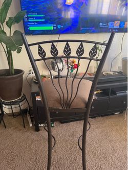 Set of 4 Metal Bar Stools with leaf designs and olive green cushions