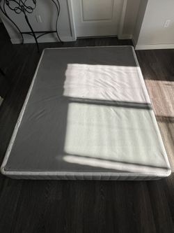 Queen Size Frame Mattress and A Large Area Rug