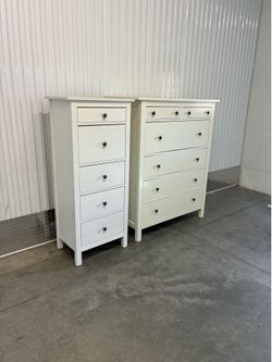 2 white Dressers