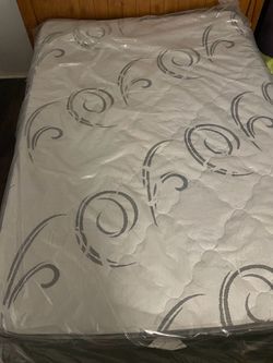 Full Size Mattress Still in Plastic Wrap