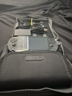 Sony PS Vita with Carrying Case and Charger