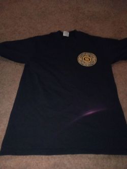 Black Graphic T-Shirt with Gold Medallion Logo