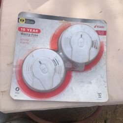 Kidde 10-Year Worry-Free Smoke Alarm Value Pack (Model i9010), featuring two units. 