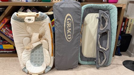 Graco Pack 'n Play with Cuddle Cove Rocking Seat
