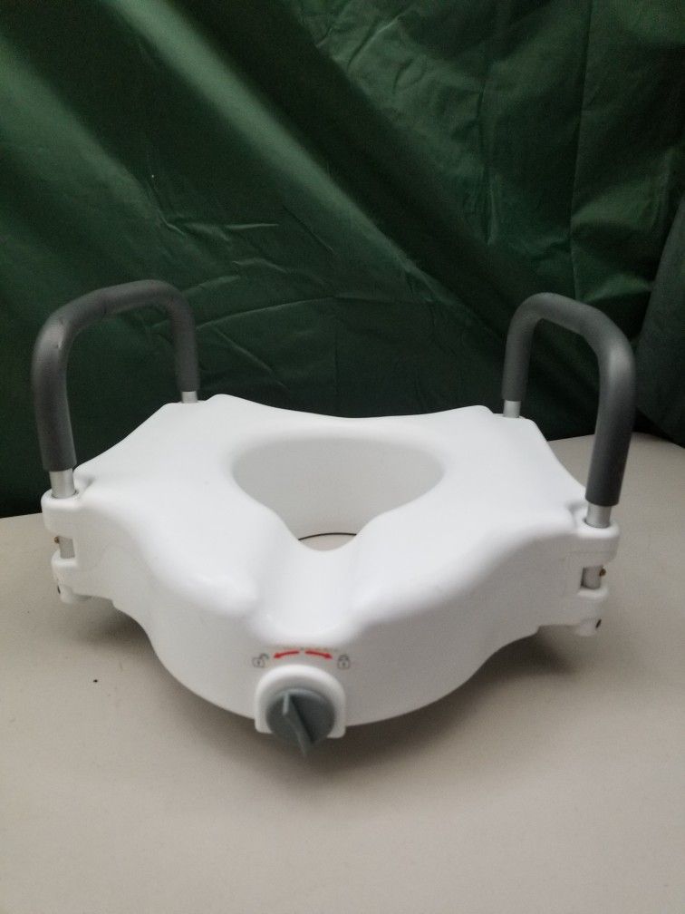 Toilet Seat Riser And Hand Rails