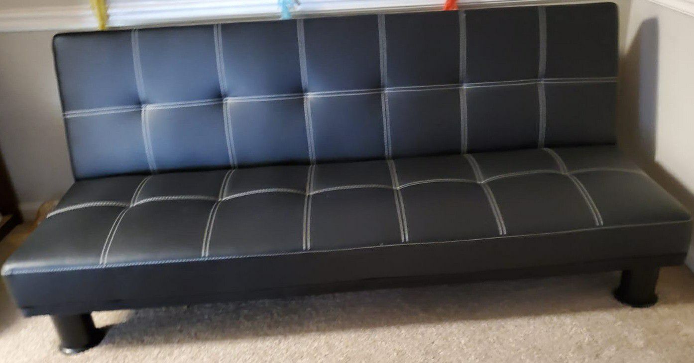 Almost new Leather Futon/bed