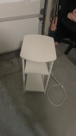 Nightstand with charger and plug