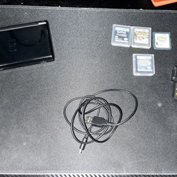 Slightly Nintendo DS with games/accessories