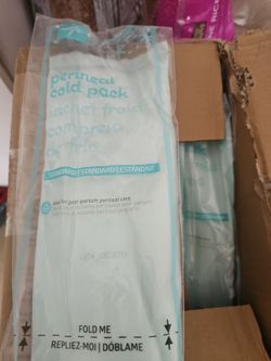 Box of free perineal cold packs for post partum women
