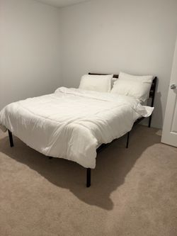 Queens sized mattress and frame