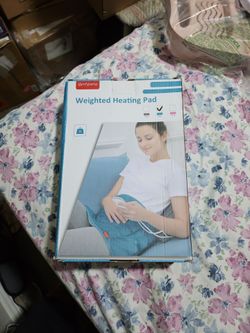 Weighted heating pad