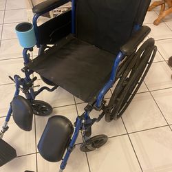 Wheelchair with adjustable footrest
