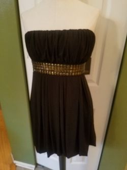 Brand new very sexy black balloon bottom dress. Size Large.