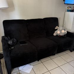 Two Leather Recliners With Covers 