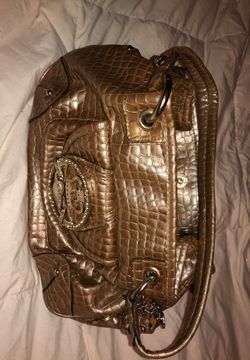 Gold leather Kathy Van Zeeland purse