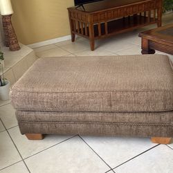 Stylish upholstered ottoman / bench