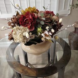 Silk Flower Arrangement In Pottery Vase