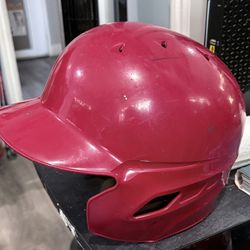 Baseball Helmet. glossy red finish with a bilateral (double) ear flap design, making it suitable for both right-handed and left-handed batters.