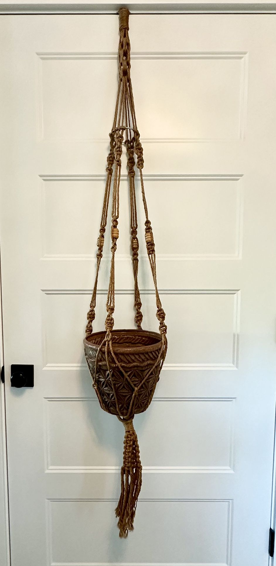  Large 5 foot 3” ( 63”) vintage boho macrame jute plant hanger w/ wood beads.  Great condition. I will also include the planter pot for free 