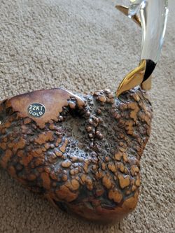 Dolphins On A 22kt Gold Base