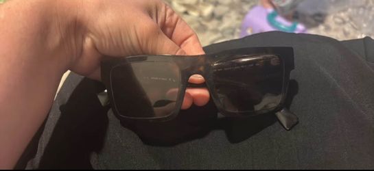 Prada Sunglasses and an extra random pair