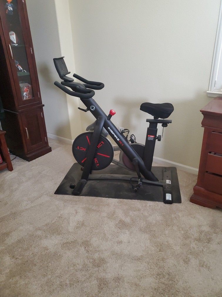 EXERCISE BIKE / INSPIRE IC1 / PAYED $500 / AT COSTCO ONLY USE MAYBE 3 TIMES ASKING/ $200