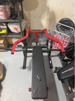 Plate-loaded gym machine and adjustable bench